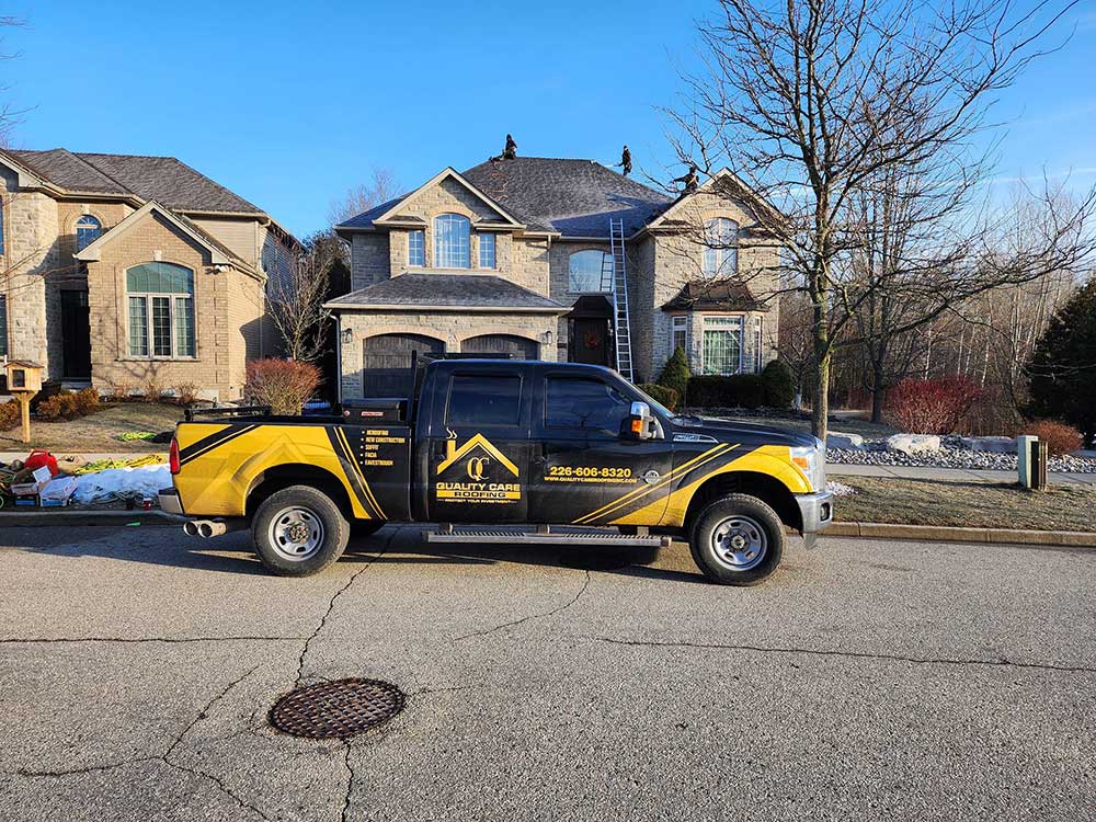 a Quality Care Roofing truck appears on-site for another residential roofing job. Quality Care Roofing is GAF Certified.