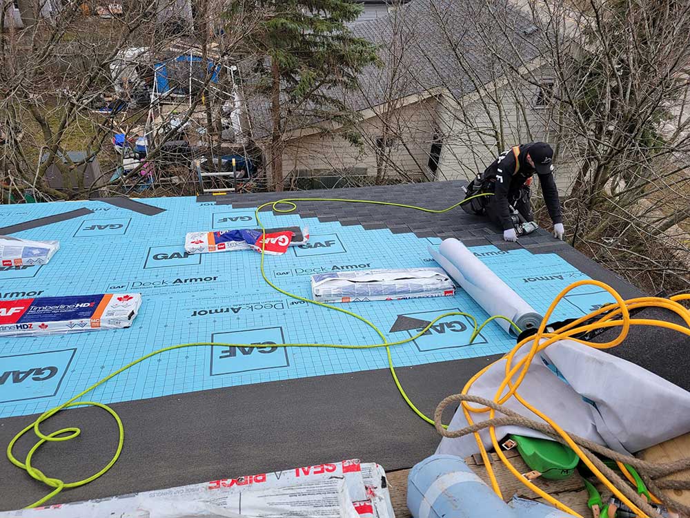 Our GAF certified roofing professionals are on-site to perform a residential roof replacement