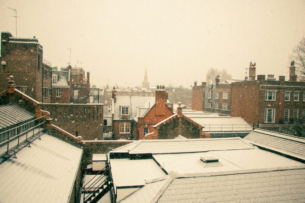 Ice Damming on Flat Roofs in Kitchener flat roof snow removal to prevent ice dams